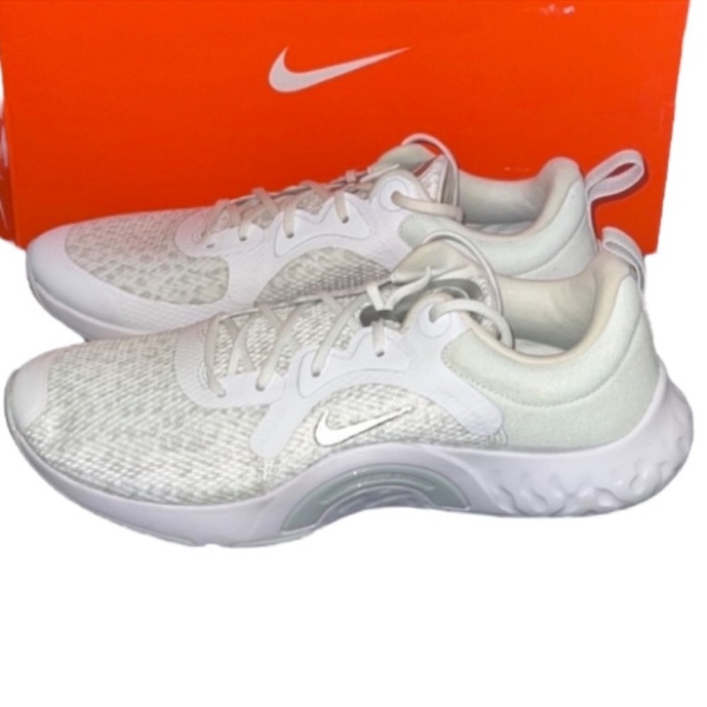 New in box authentic Nike woman’s designer sneakers sz 9 display
